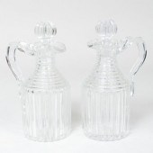 PAIR OF CUT GLASS PITCHER FORM DECANTERS