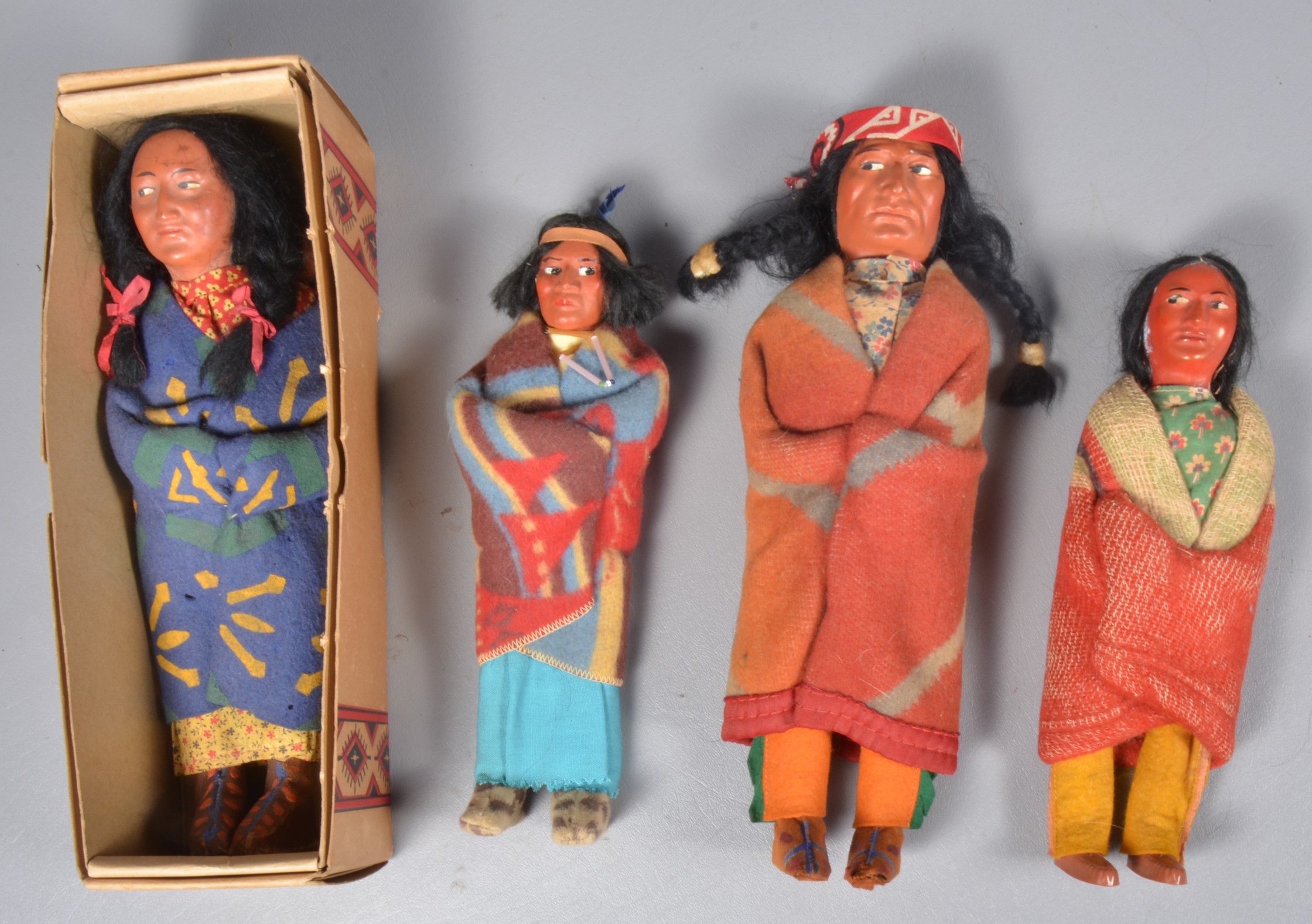 (4) Skookum dolls to include squaw