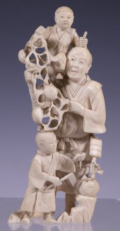 JAPANESE IVORY GENRE OKIMONO OF FATHER