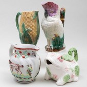 GROUP OF FOUR MAJOLICA AND CERAMIC PITCHERSComprising:

A