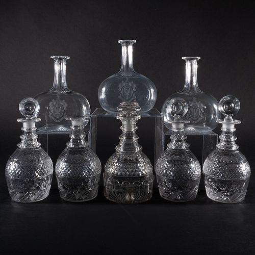 GROUP OF EIGHT CUT GLASS DECANTERS 3b9a49