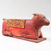 INDIAN RED PAINTED AND PARCEL-GILT WOOD