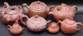 COLLECTION OF (7) CHINESE YIXING TEAPOTS.