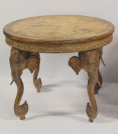 MIDCENTURY CARVED ELEPHANT TABLE. From