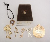 SMALL GROUP YELLOW GOLD CHARMS/PENDANTS.