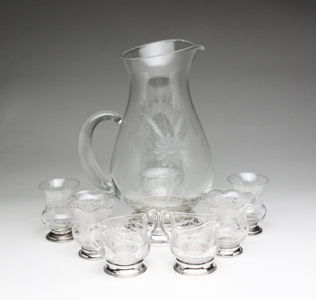 SEVEN STERLING SILVER FOOTED GLASS