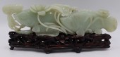 CARVED JADE FIGURAL GROUPING OF CARPS.