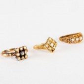THREE PEARL AND GOLD RINGSOne set with