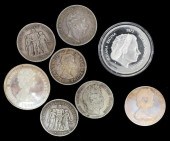  8 WORLD SILVER COINS APPROX  3c168b