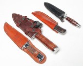 FOUR FIXED-BLADE HUNTING KNIVES. Twentieth
