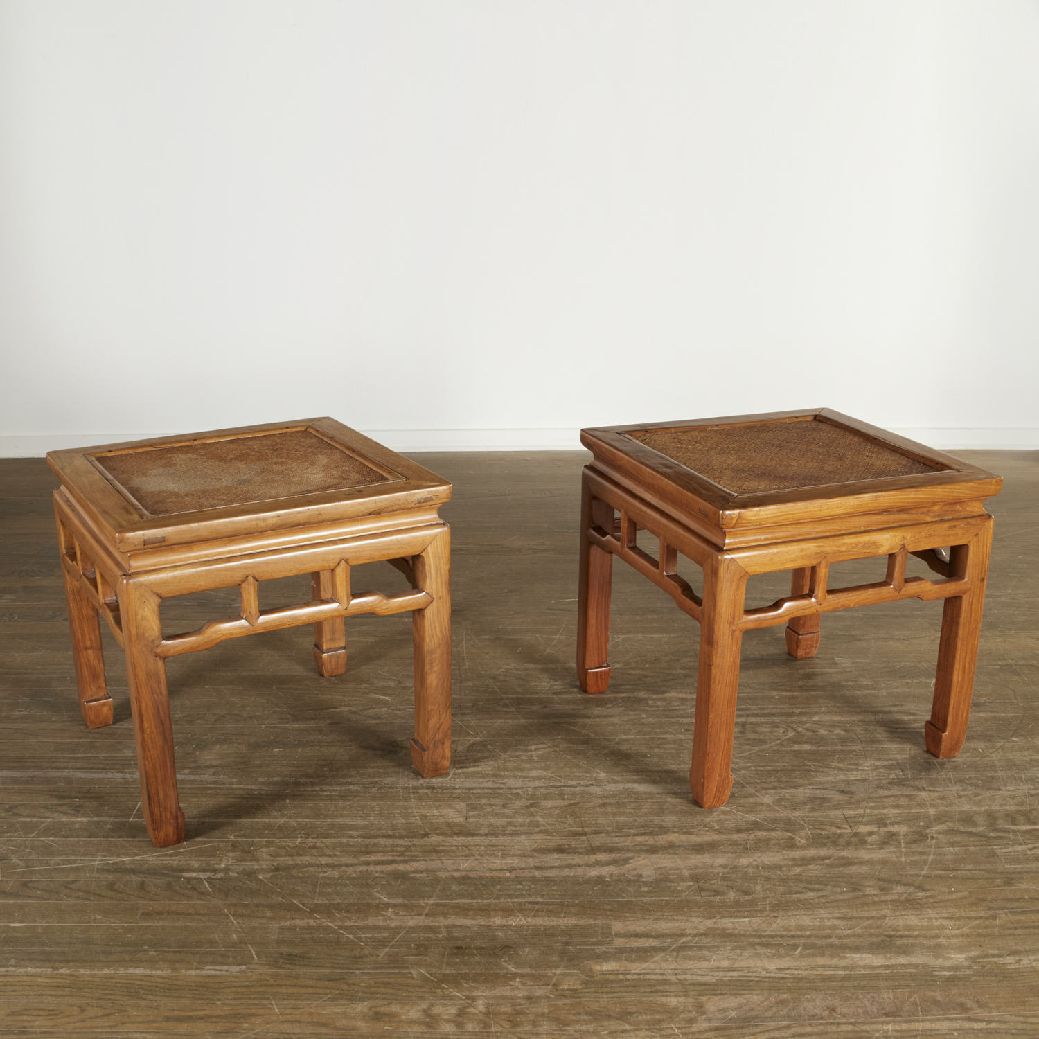 PAIR CHINESE CANED HUANGHUALI STOOLS