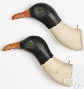 PAIR OF PAINTED AND CARVED BIRD HEAD