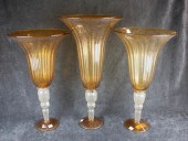 A SET OF THREE MURANO GLASS FOOTED TRUMPET