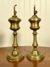 A pair of antique brass whale oil lamps,