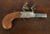 An antique flintlock pistol, engraved
