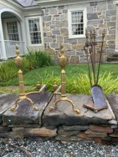 A pair of vintage brass andirons and