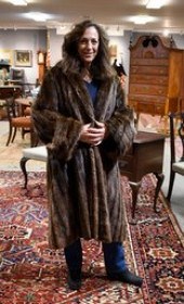 A vintage 3/4 length raccoon fur coat,