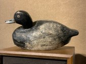 A vintage carved and painted wood duck
