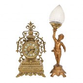 An ornate pierced brass mantel clock,