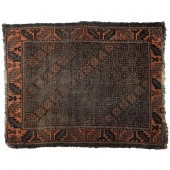 An antique Baluch rug, 124cm x 92cm