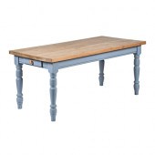 A pine kitchen table, on blue painted