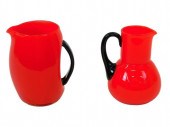 (2) PAIRPOINT FLAMBE HANDLED PITCHERS.