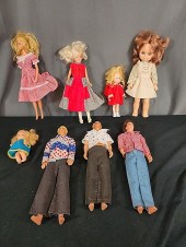 Group of Barbie, Ken and More. Includes