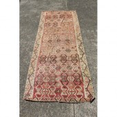 Kilim wool carpet, showing wear and