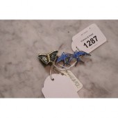 Double blue bird brooch with damages