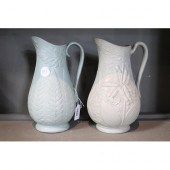 Two antique English pottery jugs, cast