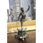 Antique French spelter figure on a tri