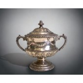 A 1907 STERLING SILVER TWIN HANDLE CUP