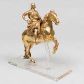 CONTINENTAL GILT-BRONZE HORSE AND RIDERRaised