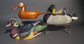 THREE WOOD DUCK DECOYS, ONE SIGNED BY