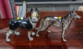 TWO CAST IRON DOG DOORSTOPS Comprising