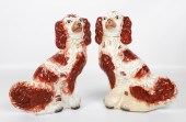 Pair of Staffordshire spaniel dog figurines,