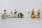 (7) Porcelain female figurines, c/o
