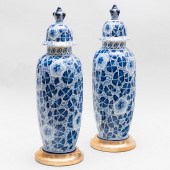 PAIR OF DELFTWARE VASES AND COVERS MOUNTED