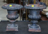A PAIR OF NEOCLASSICAL STYLE CAST IRON