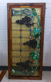 A DECORATIVE STAINED GLASS PANEL In