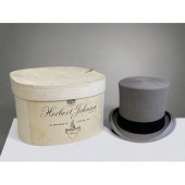 A HERBERY JOHNSON BOXED GREY TOP HAT.