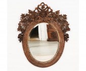 John-Richard labeled oval mirror with