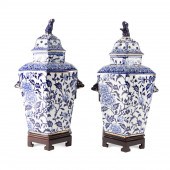 PAIR ENGLISH BLUE & WHITE URNS ON STANDS,