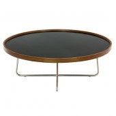 A MID CENTURY MODERN ROUND COFFEE TABLE