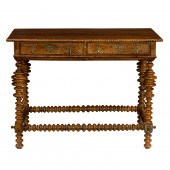 A SPANISH COLONIAL OAK WRITING TABLE