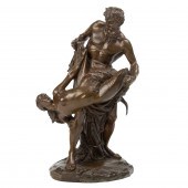 A GERMAN PATINATED BRONZE FIGURAL GROUP: