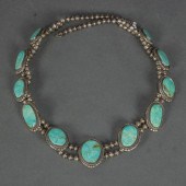 A NAVAJO TURQUOISE STERLING SILVER DOUBLE