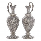 A PAIR OF DUTCH SILVER EWERS FASHIONED