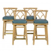 A SET OF FOUR MCGUIRE RATTAN AND LEATHER