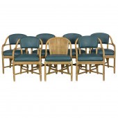 A SUITE OF SIX MCGUIRE RATTAN ARMCHAIRS